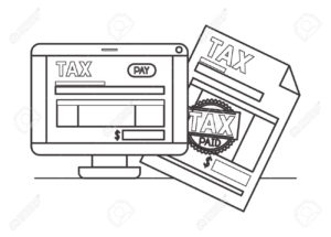 Tax document and computer screen with tax document